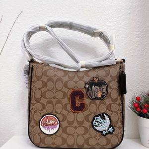 Coach Ellie File Bag In Signature Canvas With Disco Patches